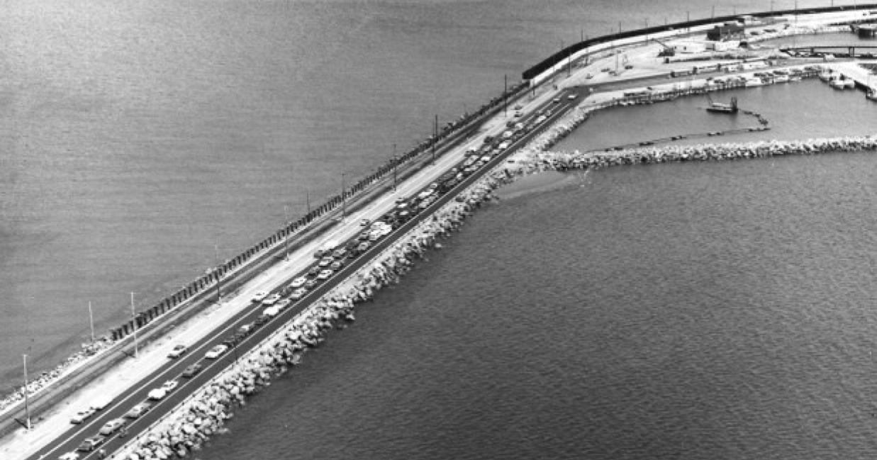 cars lined up on causeway to board the ferry at cape tormentine terminal